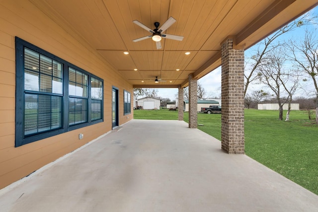 view of patio featuring a ceiling fan