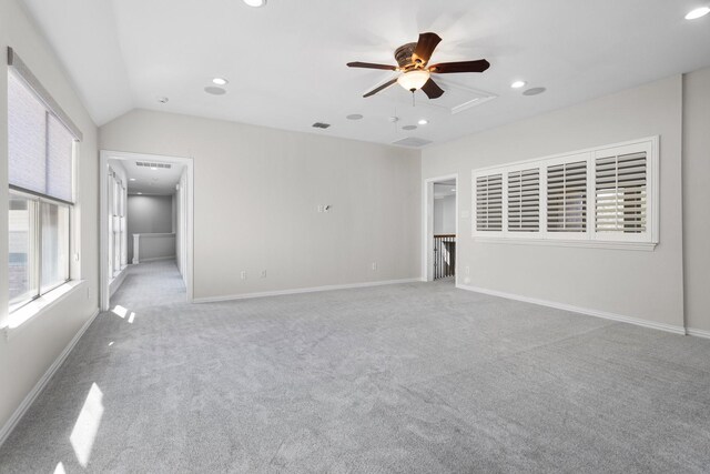 unfurnished living room featuring recessed lighting and baseboards