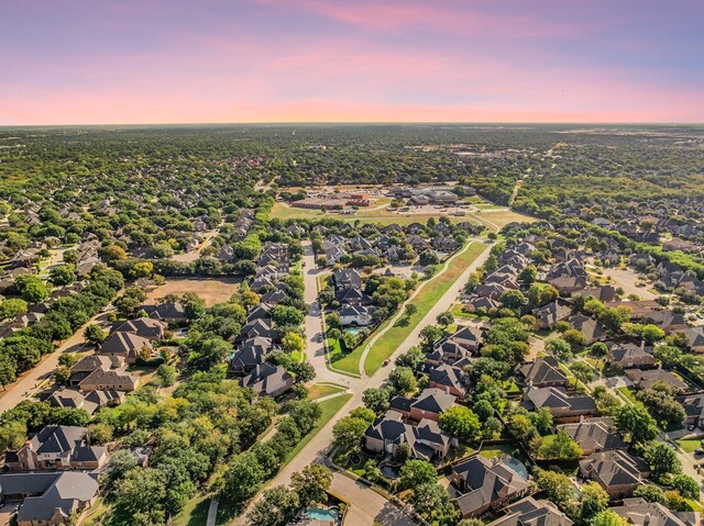 aerial view at dusk with a residential view