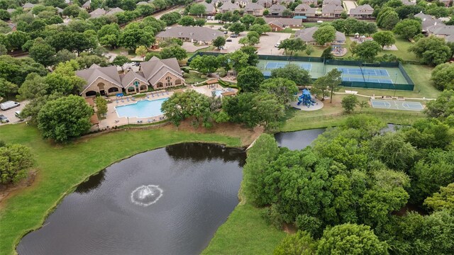 bird's eye view featuring a residential view and a water view