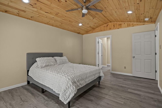 bedroom featuring wood finished floors, baseboards, lofted ceiling, recessed lighting, and wooden ceiling