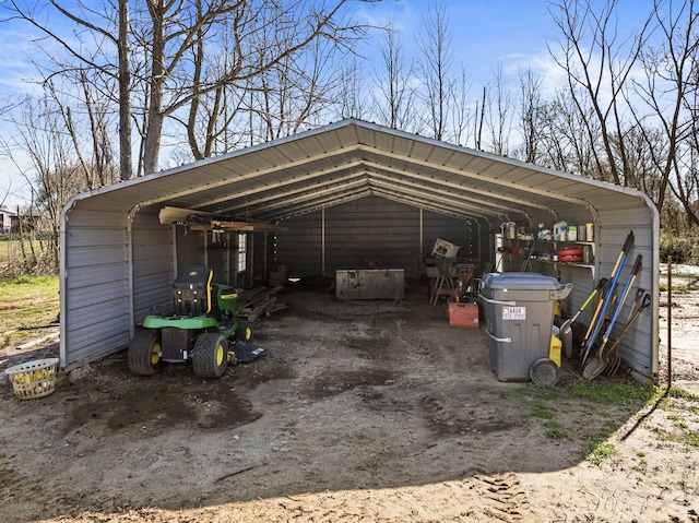 view of parking with a carport and driveway