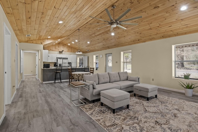 living room with ceiling fan, baseboards, wood ceiling, recessed lighting, and wood finished floors