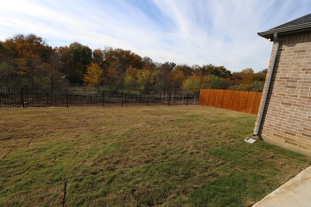 view of yard featuring fence