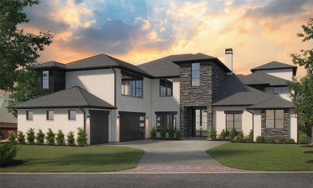 view of front facade featuring stone siding, a lawn, concrete driveway, and a garage