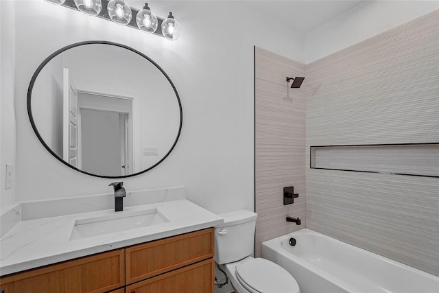 bathroom with shower / washtub combination, toilet, and vanity