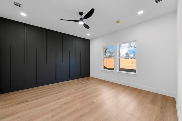 unfurnished bedroom with recessed lighting, visible vents, baseboards, and light wood finished floors