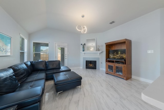 living area with visible vents, baseboards, a fireplace, and vaulted ceiling