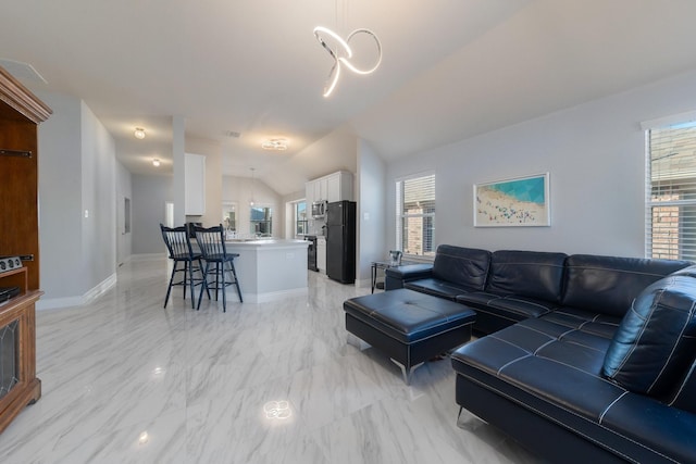 living room with baseboards, marble finish floor, lofted ceiling, and visible vents