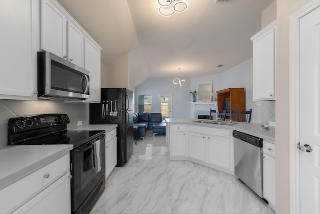 kitchen featuring tasteful backsplash, marble finish floor, black appliances, and a sink