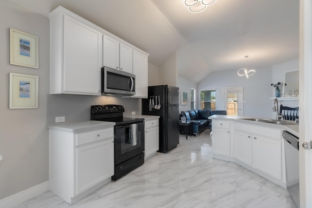 kitchen with marble finish floor, black appliances, a sink, backsplash, and lofted ceiling