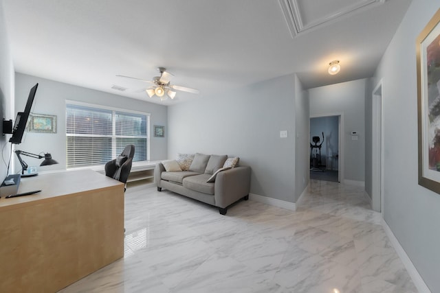 office area featuring visible vents, baseboards, marble finish floor, and ceiling fan