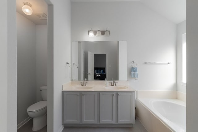 full bathroom with visible vents, toilet, a sink, double vanity, and a bath