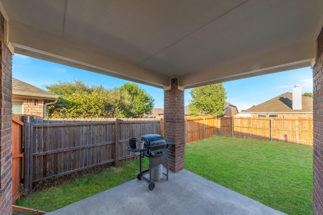 view of patio / terrace featuring a grill and a fenced backyard