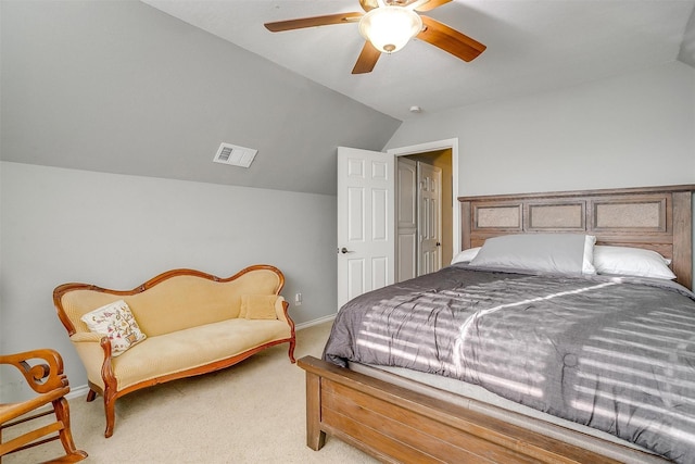 bedroom featuring lofted ceiling, a ceiling fan, visible vents, and light carpet