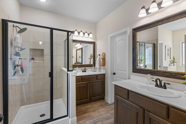 full bathroom with a sink and a stall shower