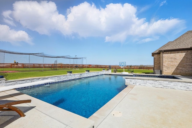 pool with a lawn, a fenced backyard, and a patio area