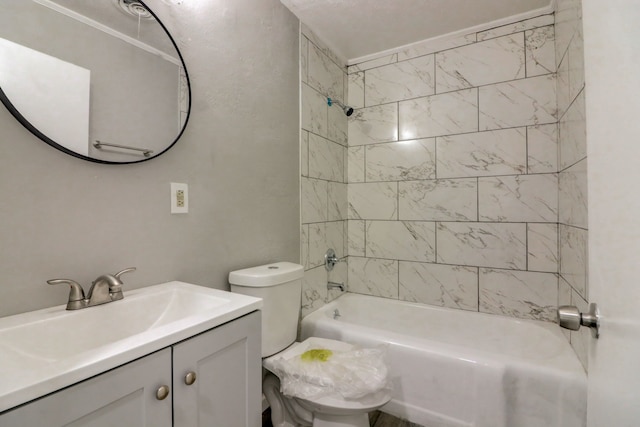 bathroom with toilet, vanity, and shower / bathing tub combination