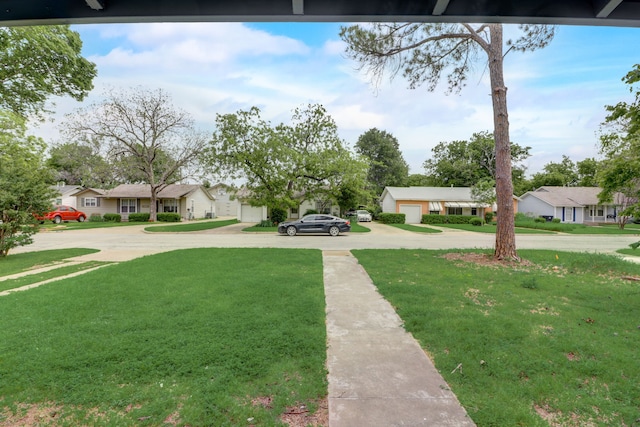 view of yard featuring a residential view