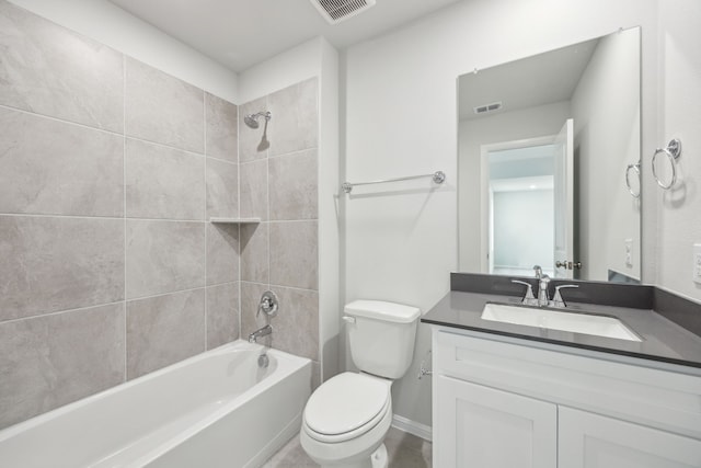 bathroom with visible vents, toilet, bathtub / shower combination, and vanity