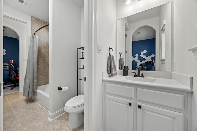 ensuite bathroom featuring visible vents, toilet, ensuite bathroom, tile patterned floors, and vanity