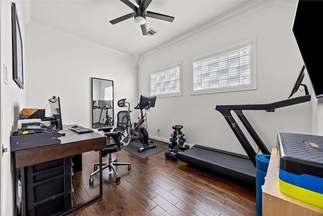 exercise room featuring visible vents, crown molding, baseboards, ceiling fan, and hardwood / wood-style flooring