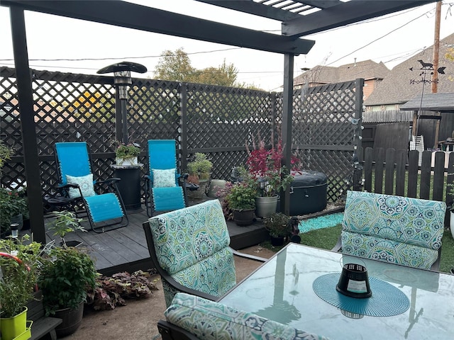 view of patio / terrace featuring fence, a pergola, and a wooden deck