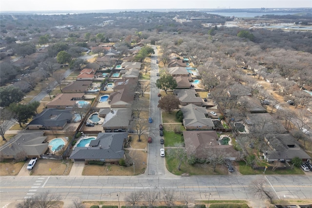 birds eye view of property with a residential view