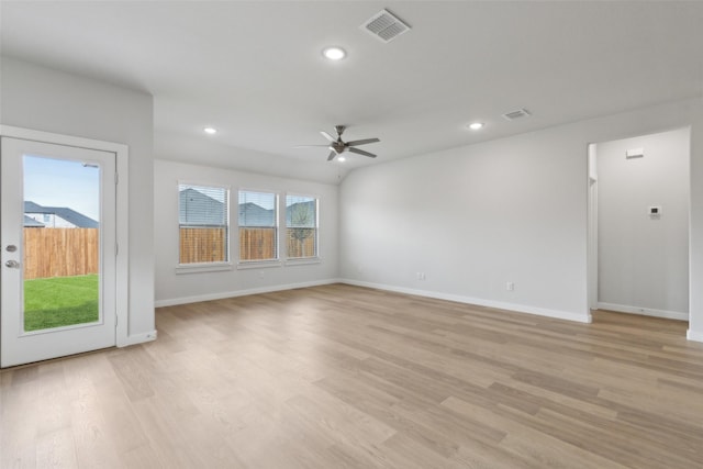 spare room with baseboards, recessed lighting, visible vents, and light wood-type flooring