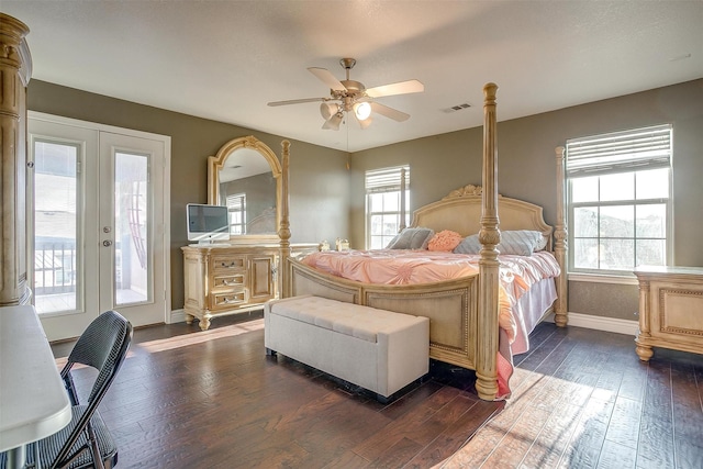 bedroom featuring access to exterior, visible vents, baseboards, dark wood finished floors, and french doors