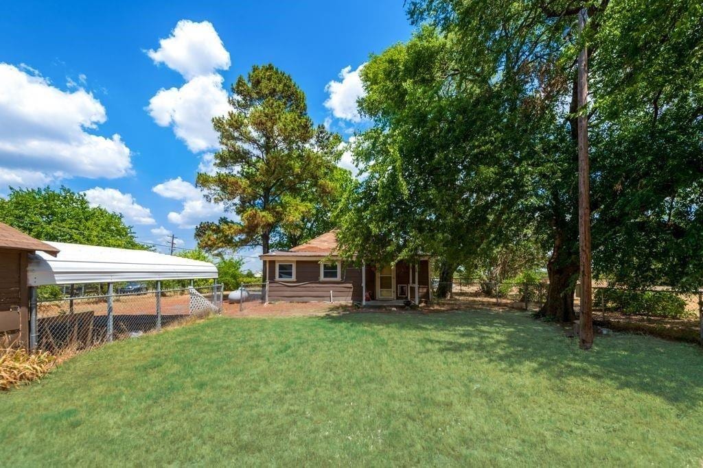 view of yard featuring fence