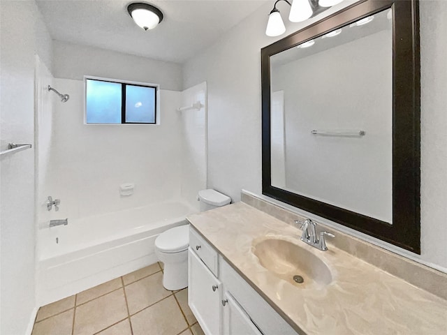 bathroom featuring tile patterned flooring, vanity, toilet, and tub / shower combination