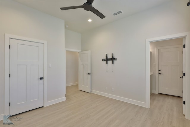 unfurnished bedroom with a ceiling fan, visible vents, baseboards, recessed lighting, and light wood-style floors