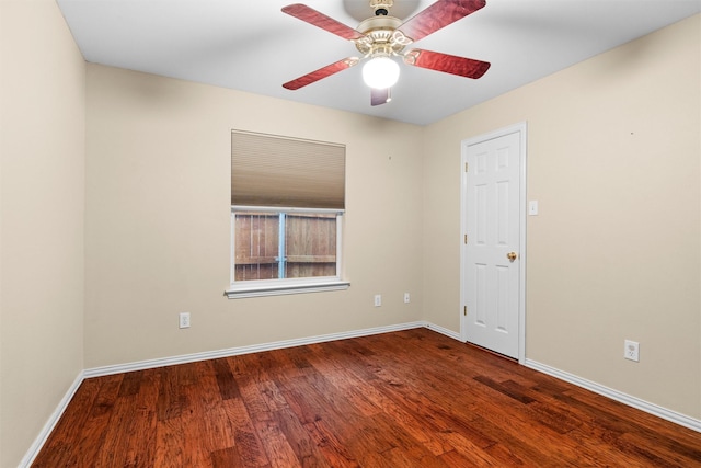 unfurnished room featuring wood finished floors, baseboards, and ceiling fan