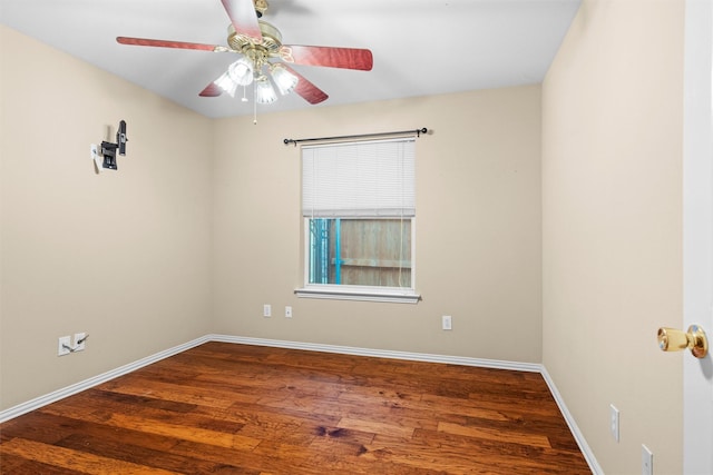 unfurnished room with ceiling fan, baseboards, and wood finished floors