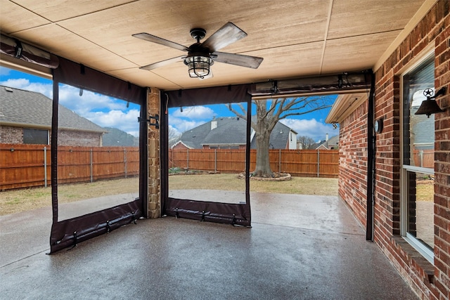 view of patio featuring ceiling fan and a fenced backyard