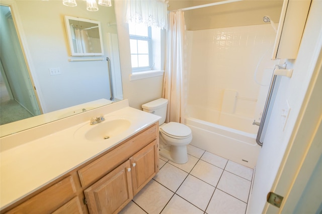 bathroom with tile patterned floors, shower / bath combo with shower curtain, toilet, and vanity