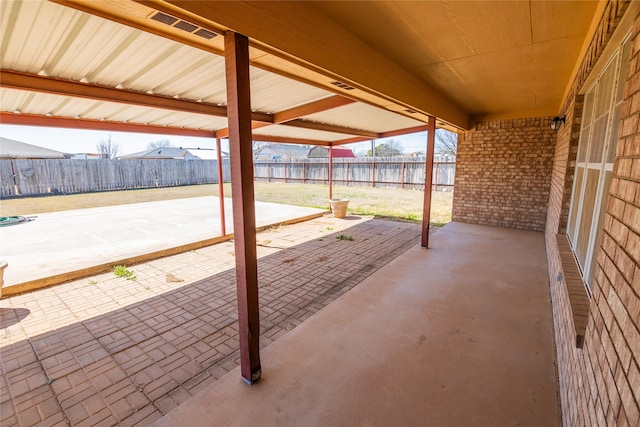 view of patio featuring visible vents and a fenced backyard