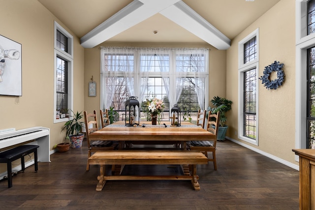 dining area featuring beamed ceiling, baseboards, dark wood-type flooring, and coffered ceiling