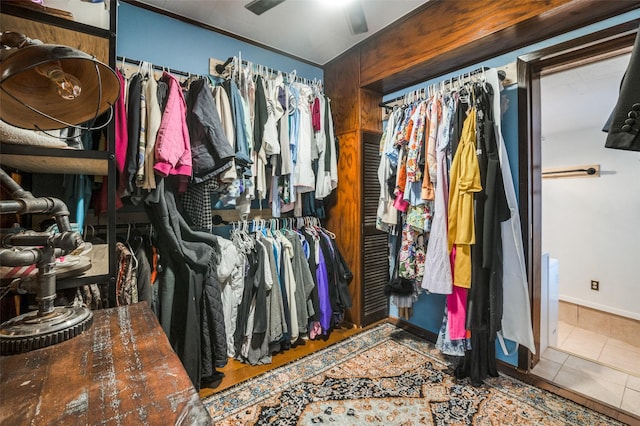 spacious closet with tile patterned flooring and a ceiling fan