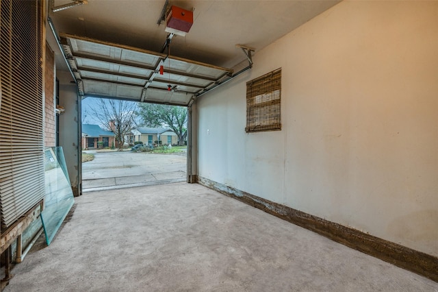 garage featuring a garage door opener