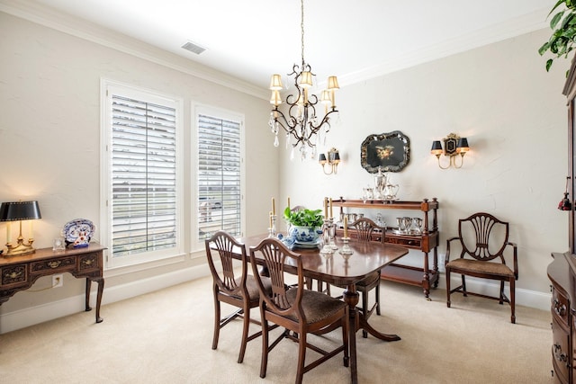 dining space featuring a notable chandelier, light colored carpet, visible vents, and ornamental molding