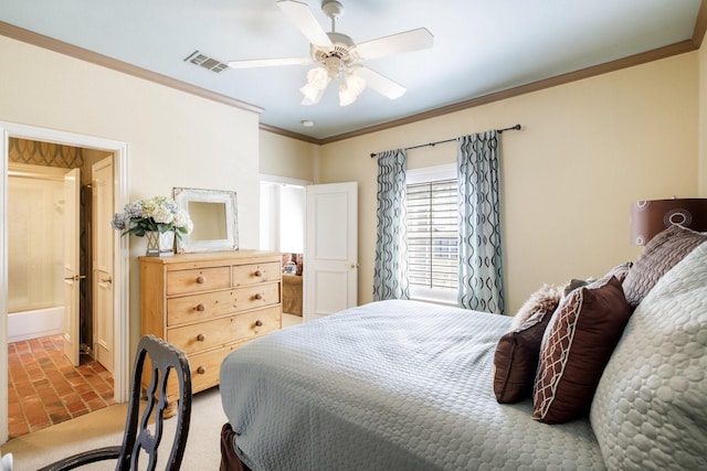 bedroom featuring visible vents, ornamental molding, connected bathroom, brick floor, and ceiling fan