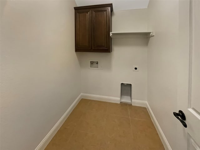 laundry room with baseboards, washer hookup, light tile patterned floors, cabinet space, and hookup for an electric dryer