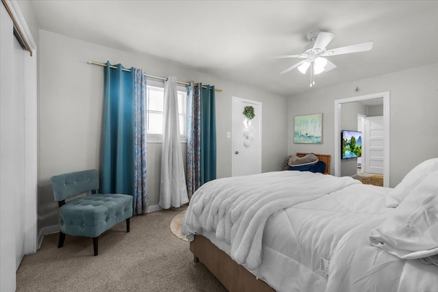 bedroom with carpet flooring, a closet, and ceiling fan