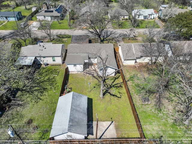 birds eye view of property with a residential view