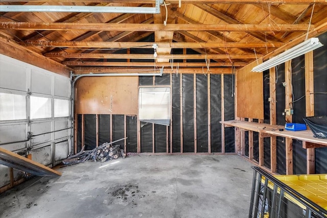 garage featuring wooden ceiling