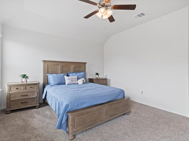 carpeted bedroom featuring visible vents, ceiling fan, baseboards, and lofted ceiling