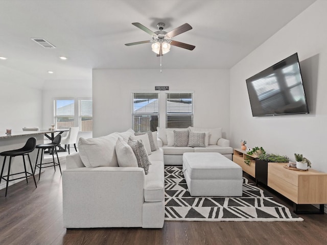 living area featuring recessed lighting, visible vents, ceiling fan, and dark wood-style flooring