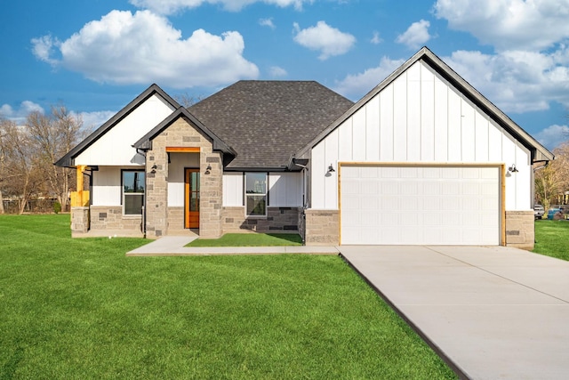 modern farmhouse with a front yard, a shingled roof, a garage, stone siding, and board and batten siding